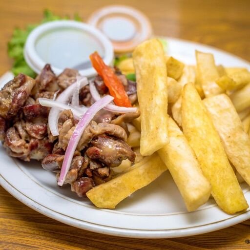 Yam fries with gizzard / chicken wings image