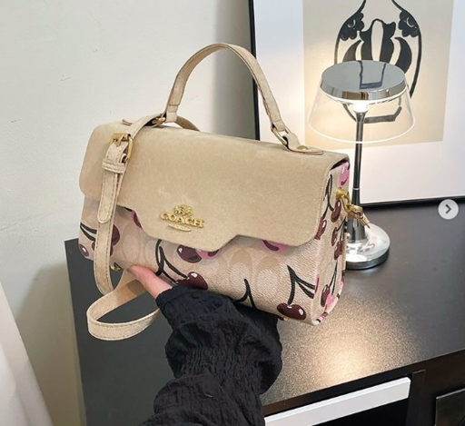 Coach mini klare crossbody bag in signature canvas with cherry print image