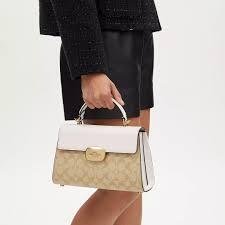 Coach | eliza top handle in signature canvas image